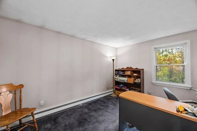 a room with furniture and window