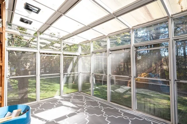 a house view with a glass door