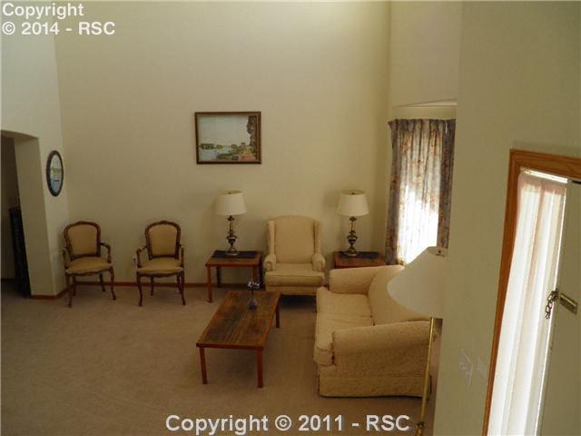 8585 Tibbs Road Peyton, CO 80831 - Photo 6 of 16 With Huge Vaulted Ceilings