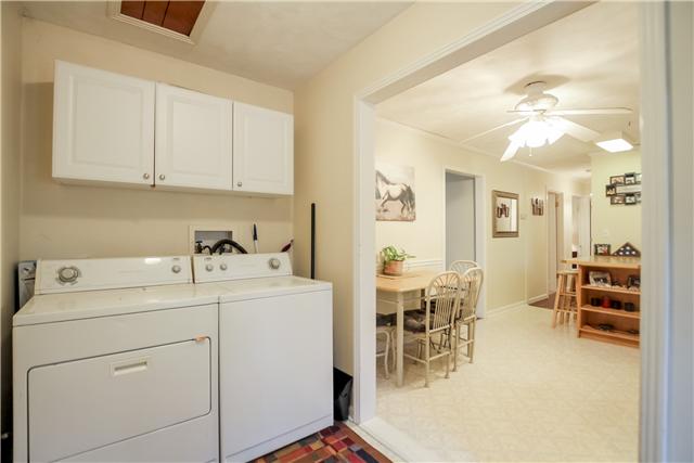 375 Edmondson Ferry Road Clarksville, TN 37040 - Photo 12 of 20 Laundry room offers overhead cabinets for additional storage.