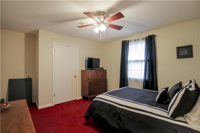 375 Edmondson Ferry Road Clarksville, TN 37040 - Photo 15 of 20 Large master with ceiling fan located in the front corner of house.