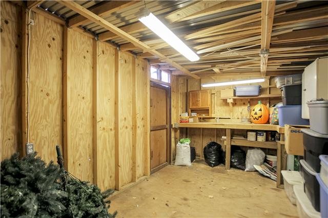 375 Edmondson Ferry Road Clarksville, TN 37040 - Photo 18 of 20 Nice space to work with Electricity already installed. 2 sides that join one side is floor for work space. The other side has gravel floor for yard equipment and bicycles.