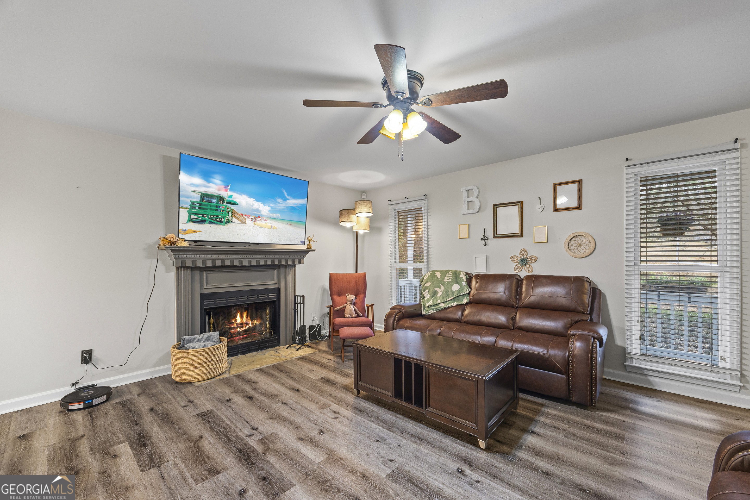 129 Pheasant Run Bogart, GA 30622 - Photo 11 of 50 a living room with furniture and a fireplace