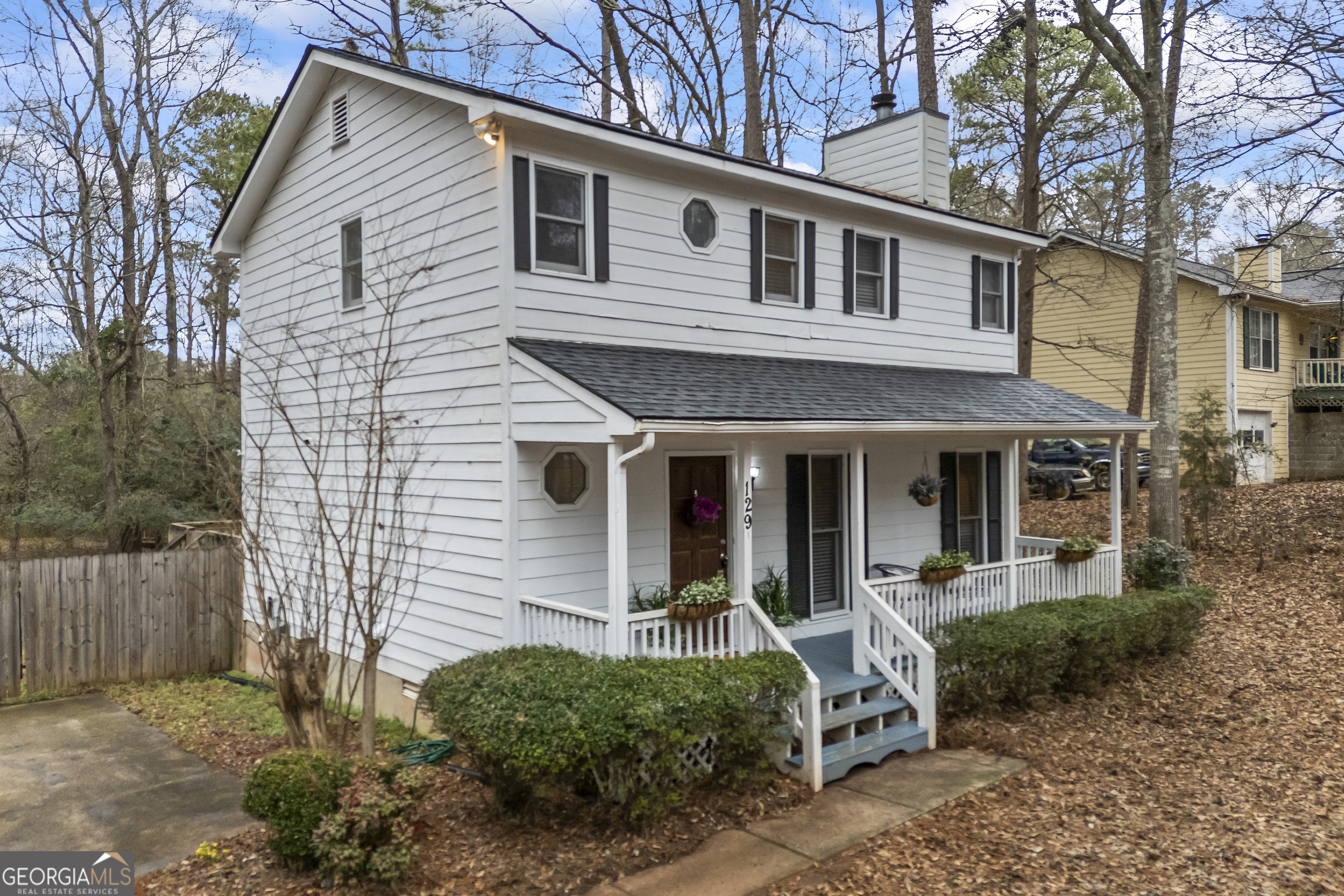 129 Pheasant Run Bogart, GA 30622 - Photo 3 of 50 a front view of a house with garden