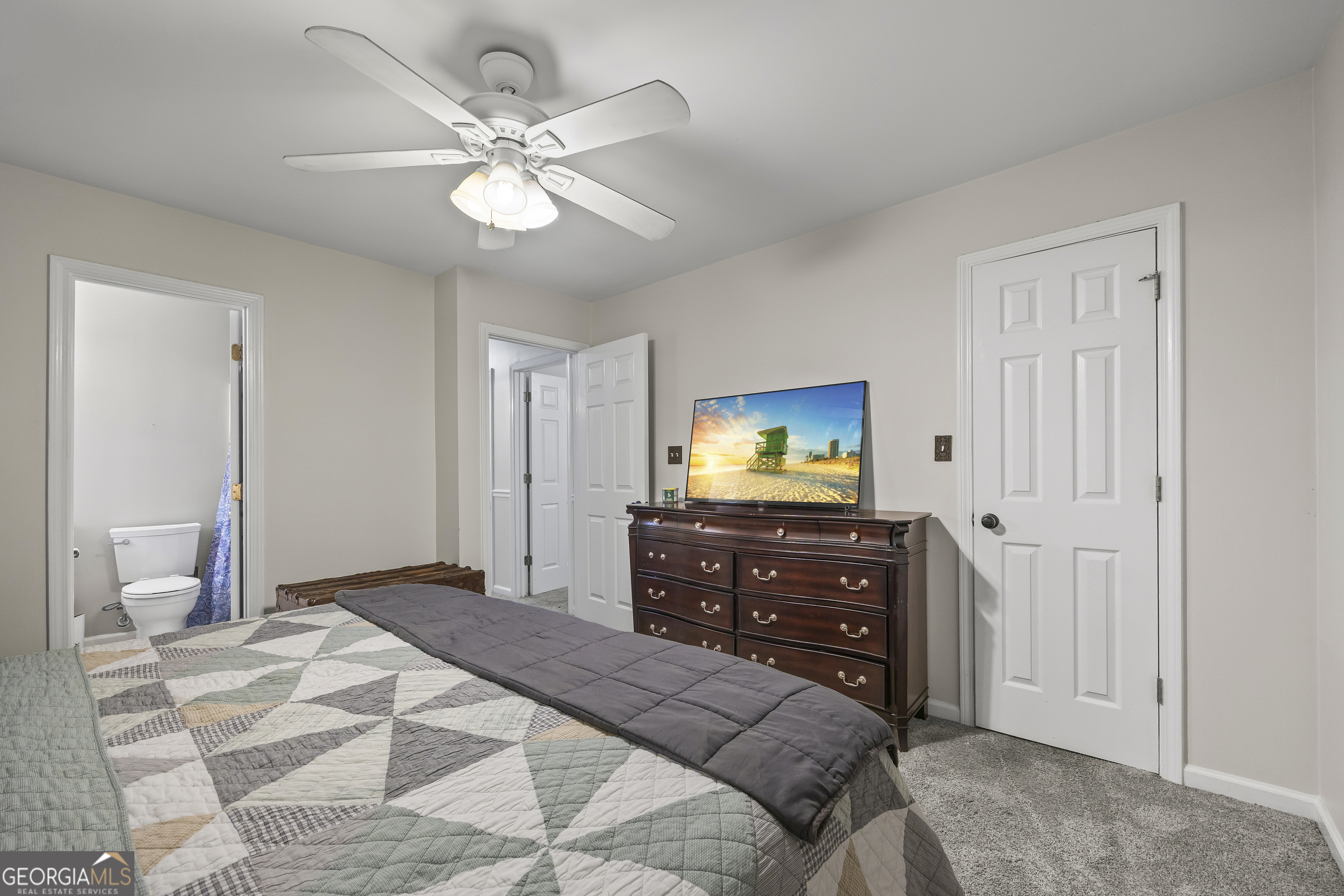 129 Pheasant Run Bogart, GA 30622 - Photo 31 of 50 a bedroom with a bed and a mirror on dresser
