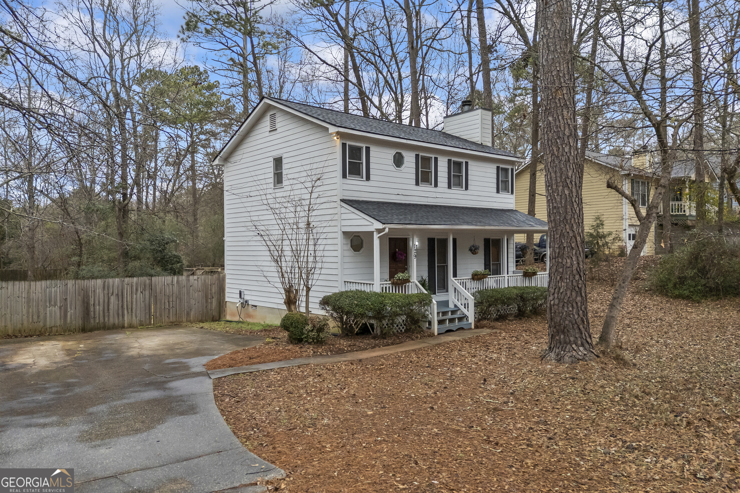 129 Pheasant Run Bogart, GA 30622 - Photo 37 of 50 a front view of a house with garden