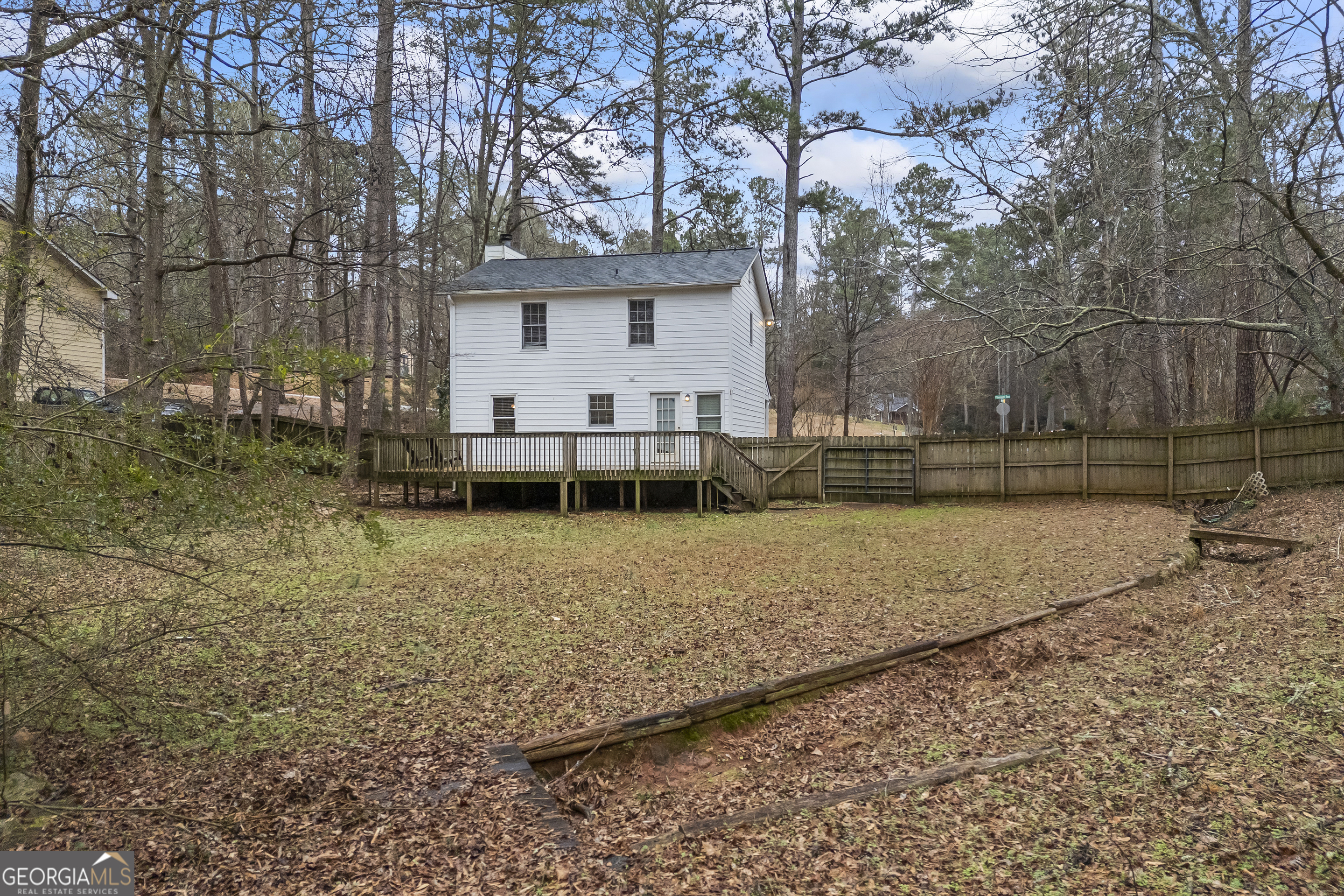 129 Pheasant Run Bogart, GA 30622 - Photo 38 of 50 a view of a house with a yard and sitting area