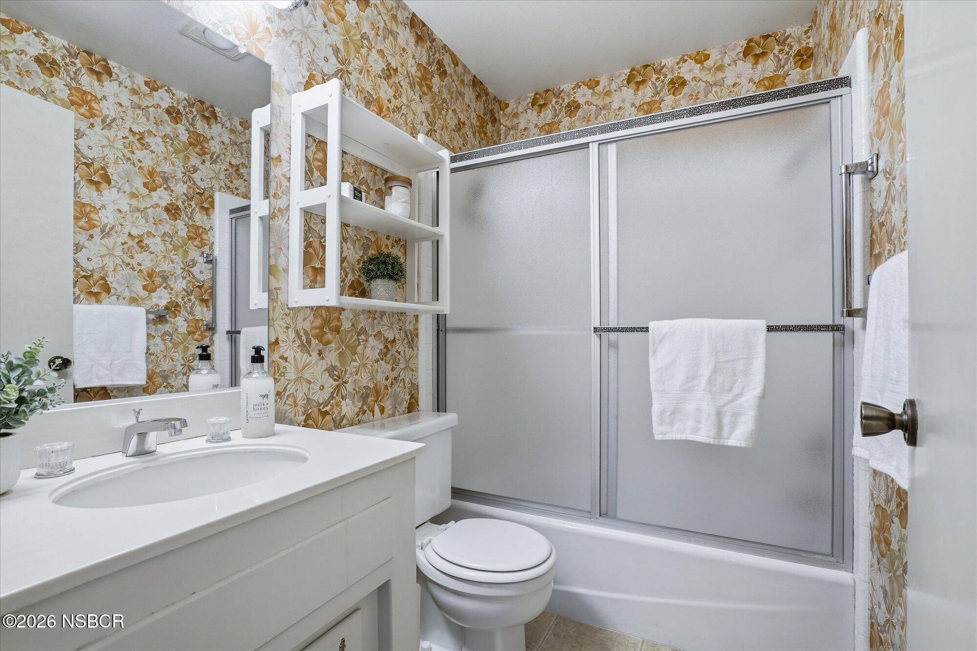 166 Tallyho Road Santa Maria, CA 93455 - Photo 15 of 20 a bathroom with a sink toilet and shower
