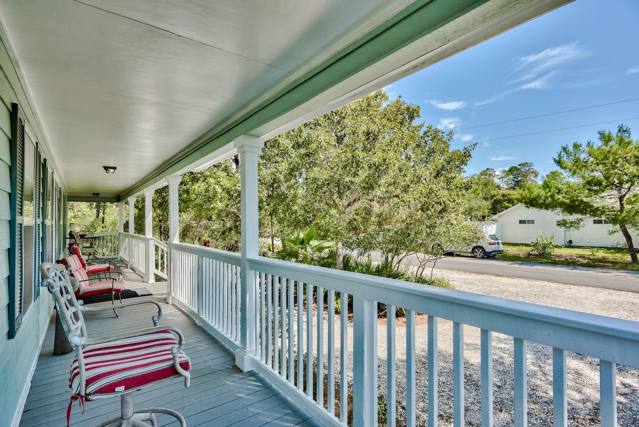 197 Acacia Street Santa Rosa Beach, FL 32459 - Photo 32 of 40 a balcony with chairs