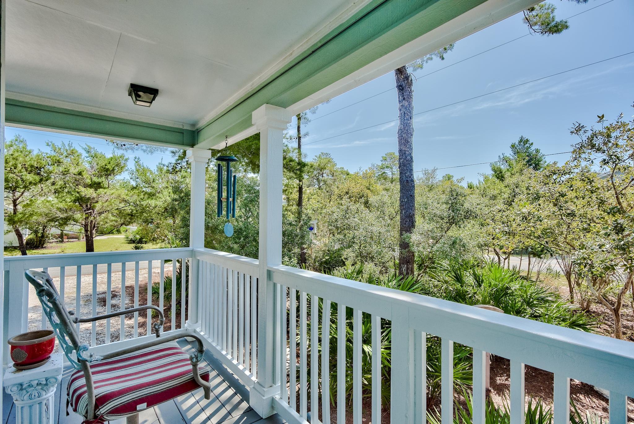 197 Acacia Street Santa Rosa Beach, FL 32459 - Photo 33 of 40 a view of a balcony with wooden floor