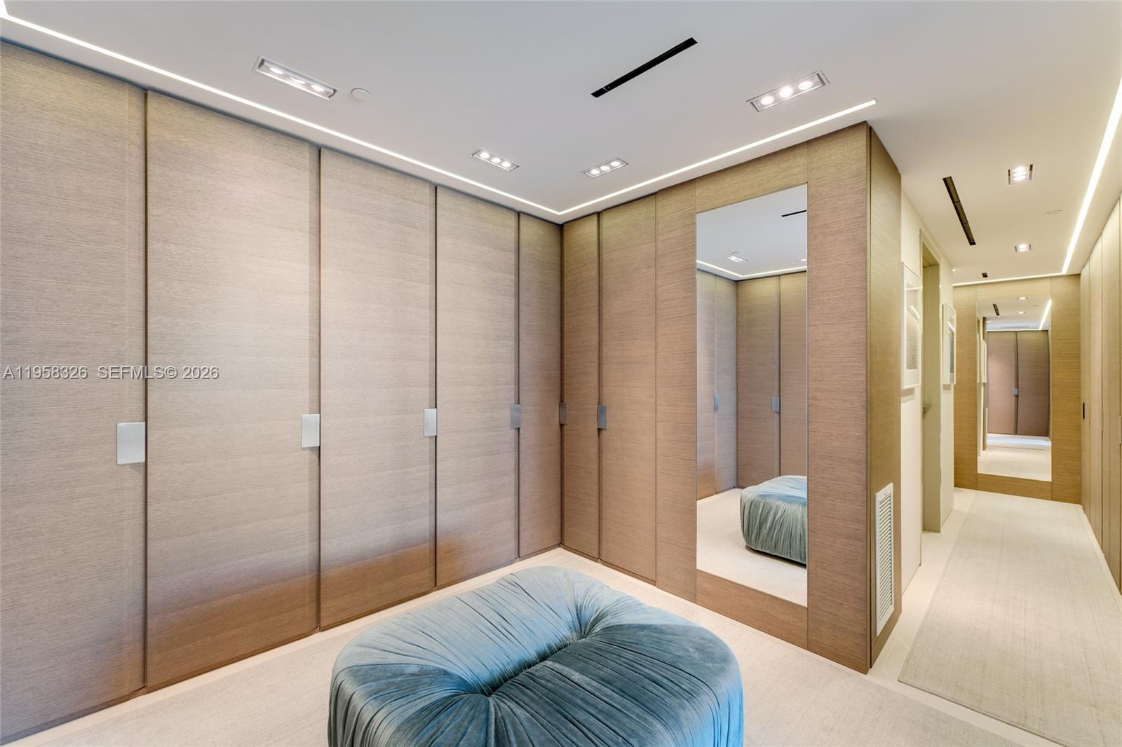 350 Ocean Drive, Unit 701N Key Biscayne, FL 33149 - Photo 13 of 52 a spacious bathroom with a bathtub and shower