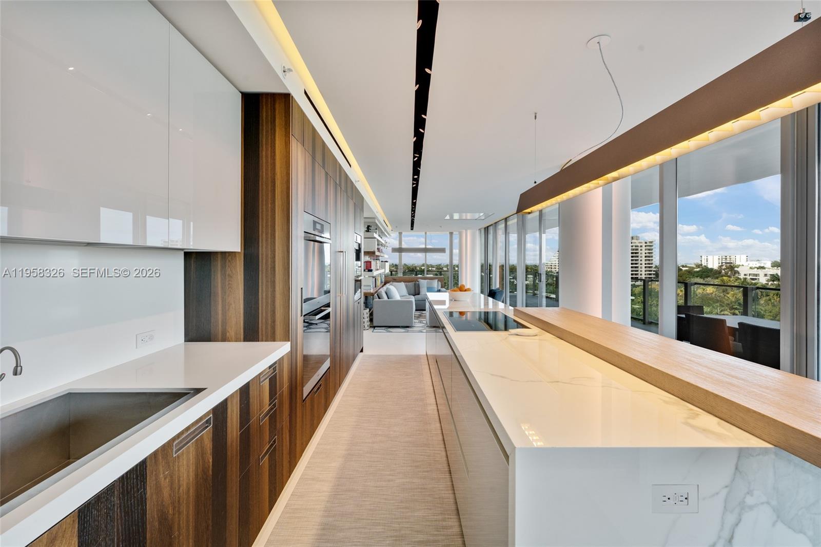 350 Ocean Drive, Unit 701N Key Biscayne, FL 33149 - Photo 15 of 52 a view of a living room with furniture and a large window