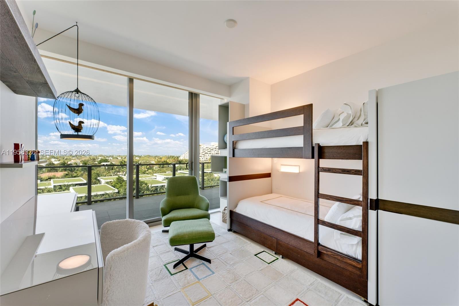 350 Ocean Drive, Unit 701N Key Biscayne, FL 33149 - Photo 25 of 52 a bedroom with furniture and a large window
