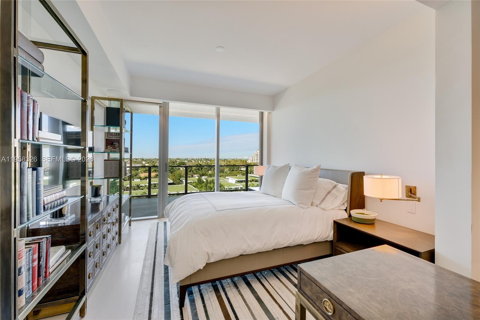 350 Ocean Drive, Unit 701N Key Biscayne, FL 33149 - Photo 28 of 52 a bedroom with two beds and a large window