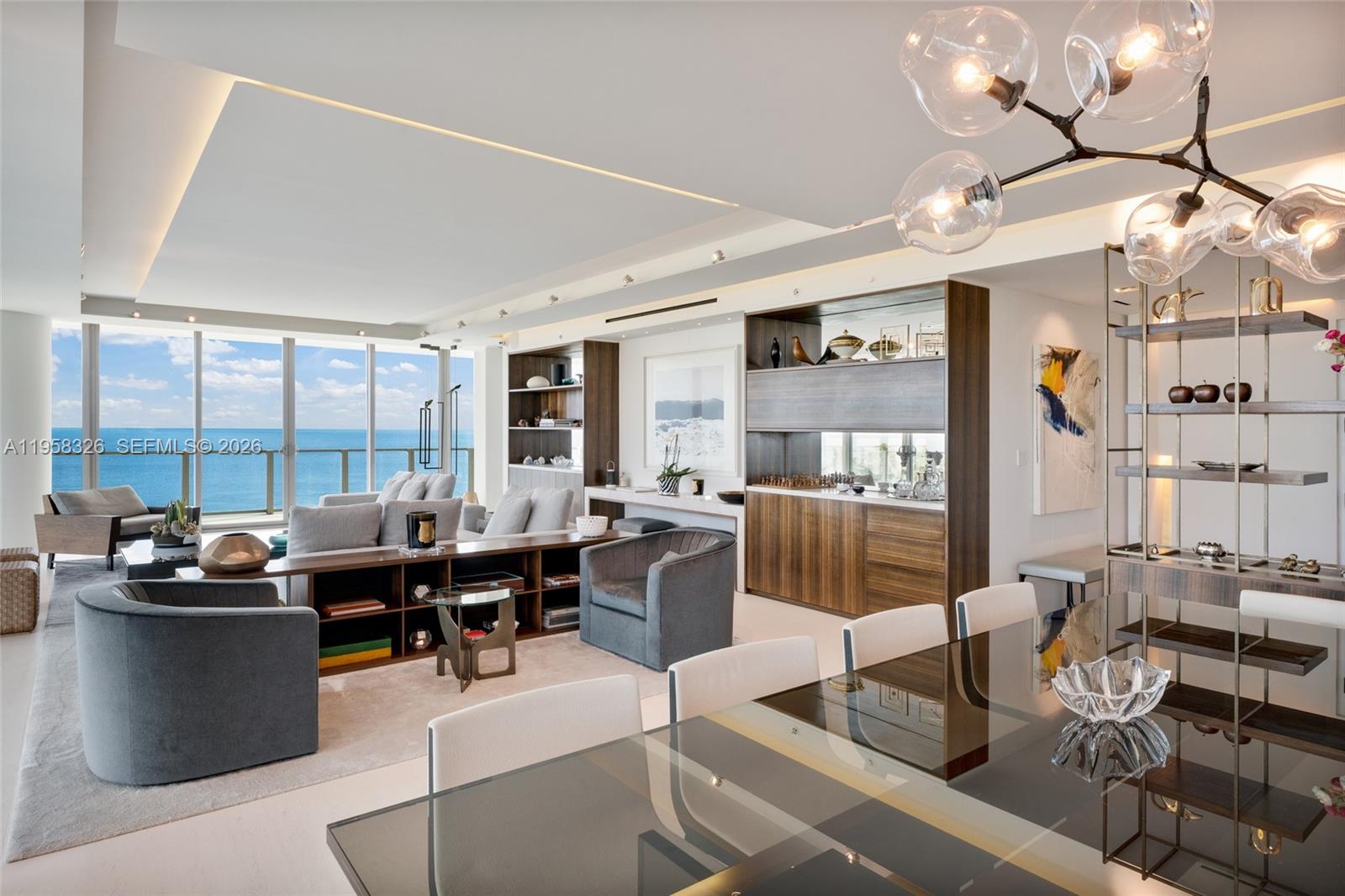 350 Ocean Drive, Unit 701N Key Biscayne, FL 33149 - Photo 3 of 52 a living room with lots of furniture and a large window