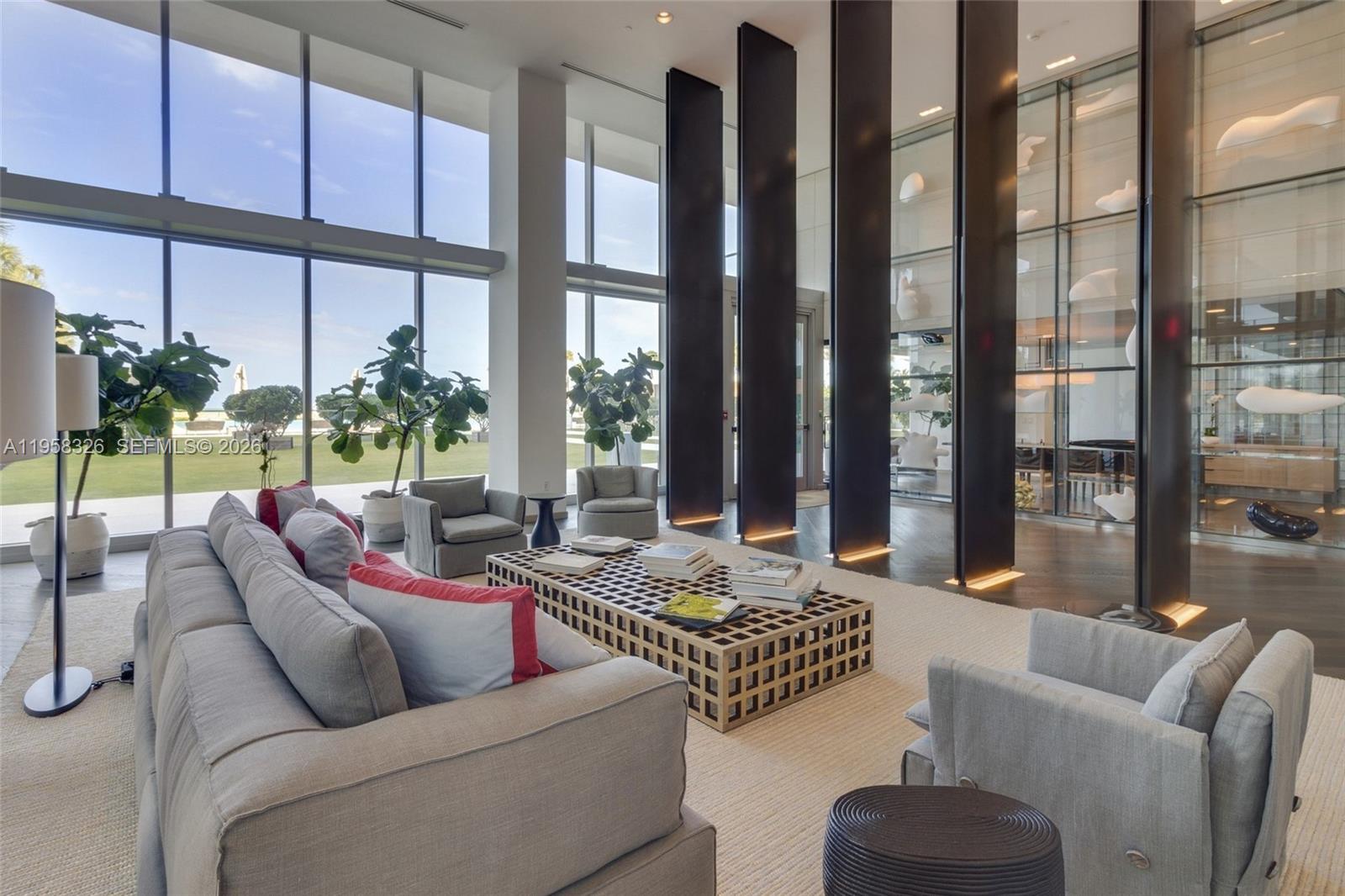 350 Ocean Drive, Unit 701N Key Biscayne, FL 33149 - Photo 51 of 52 a living room with furniture and a large window