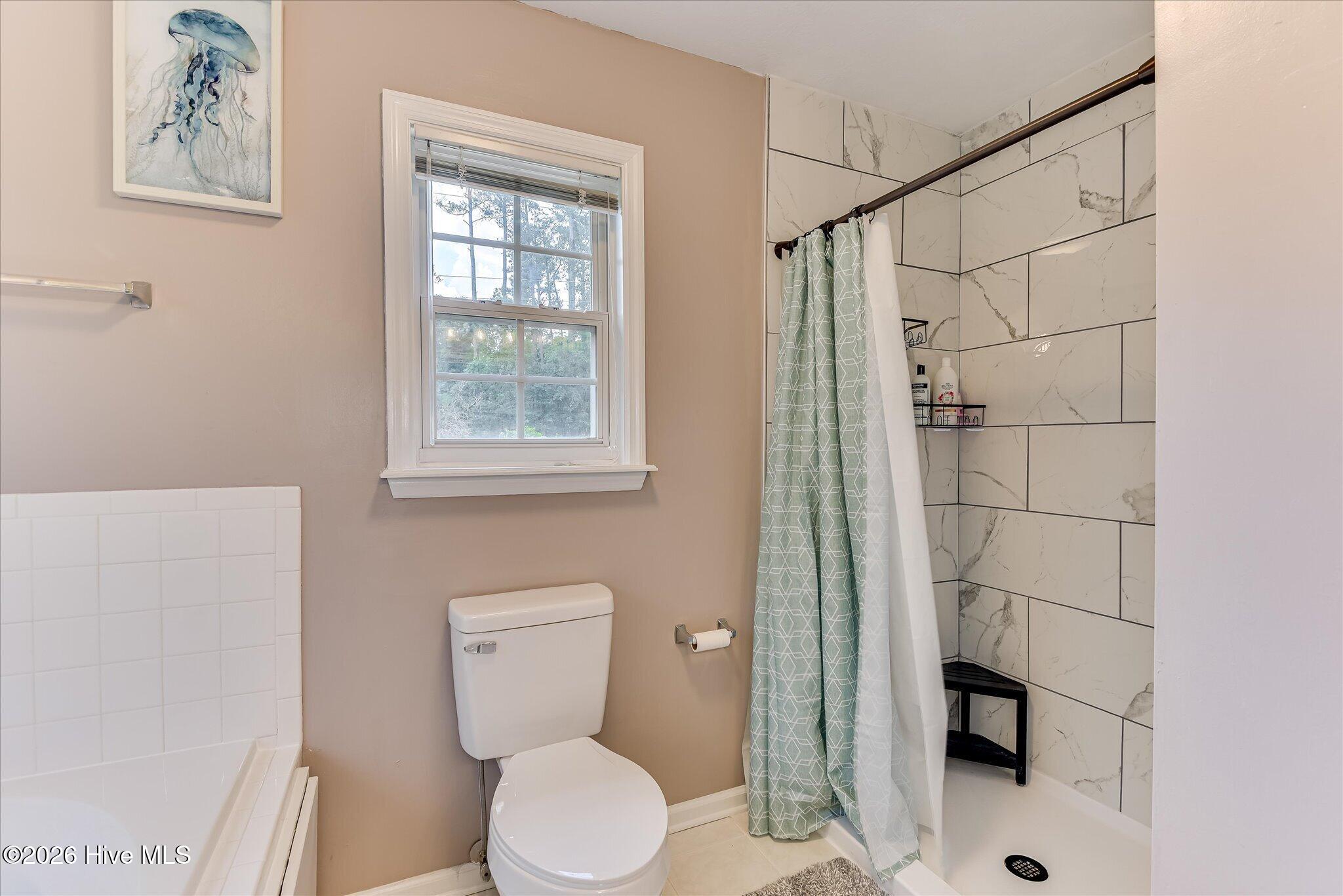 4480 Cape Cod Drive Evans, GA 30809 - Photo 19 of 55 Primary Bath also has newly renovated gorgeous tiled shower.