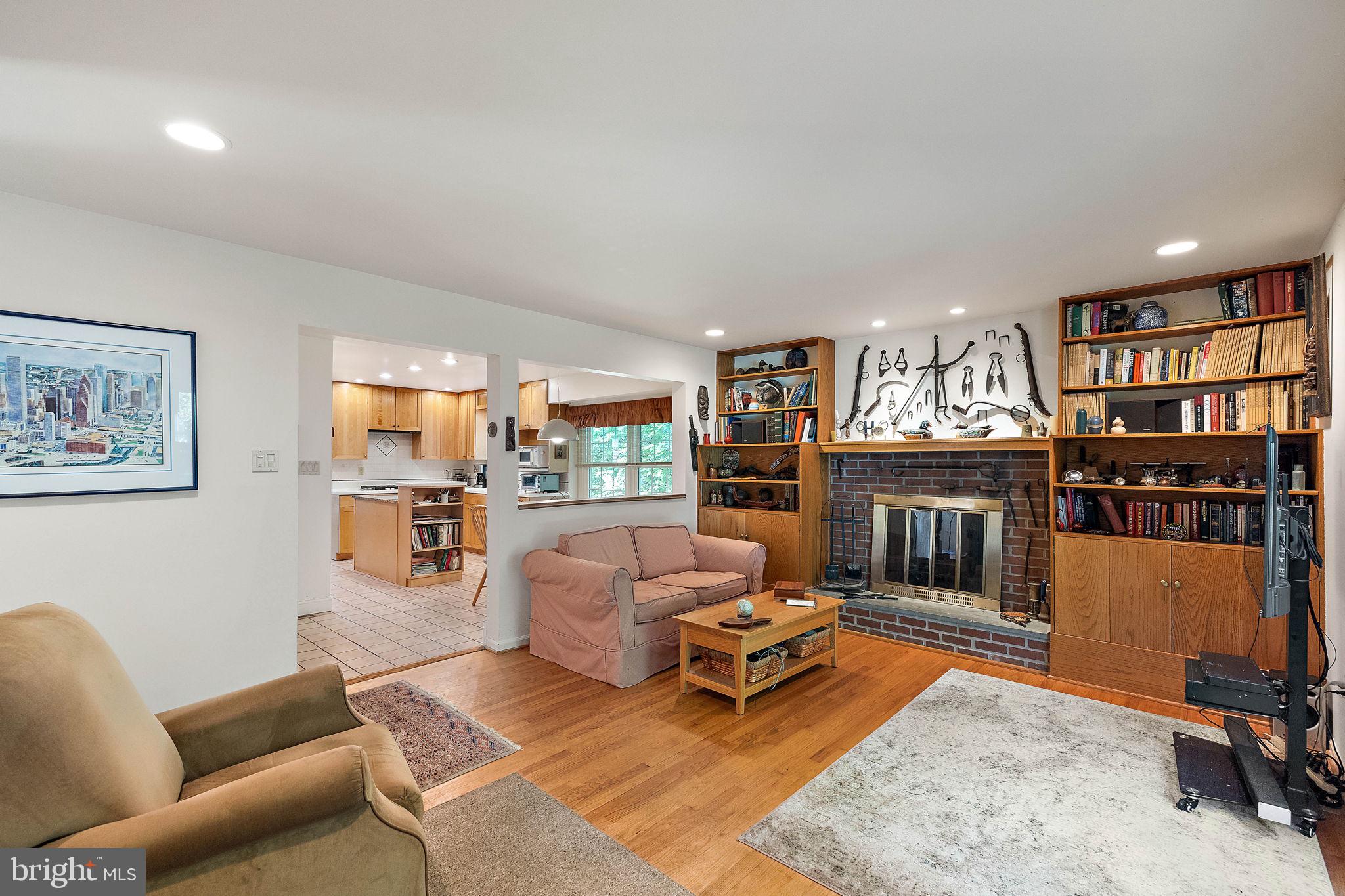 14 Kenwick Road Hockessin, DE 19707 - Photo 16 of 43 Family room with fireplace
