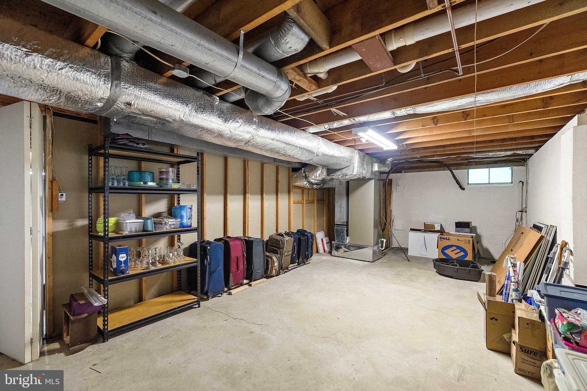 14 Kenwick Road Hockessin, DE 19707 - Photo 40 of 43 Lots of storage in the full basement