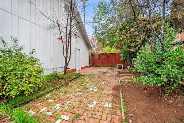 a backyard of a house with lots of green space