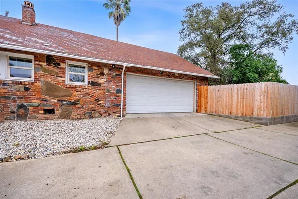 a front view of a house with a garage