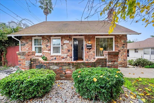 front view of a house with a patio