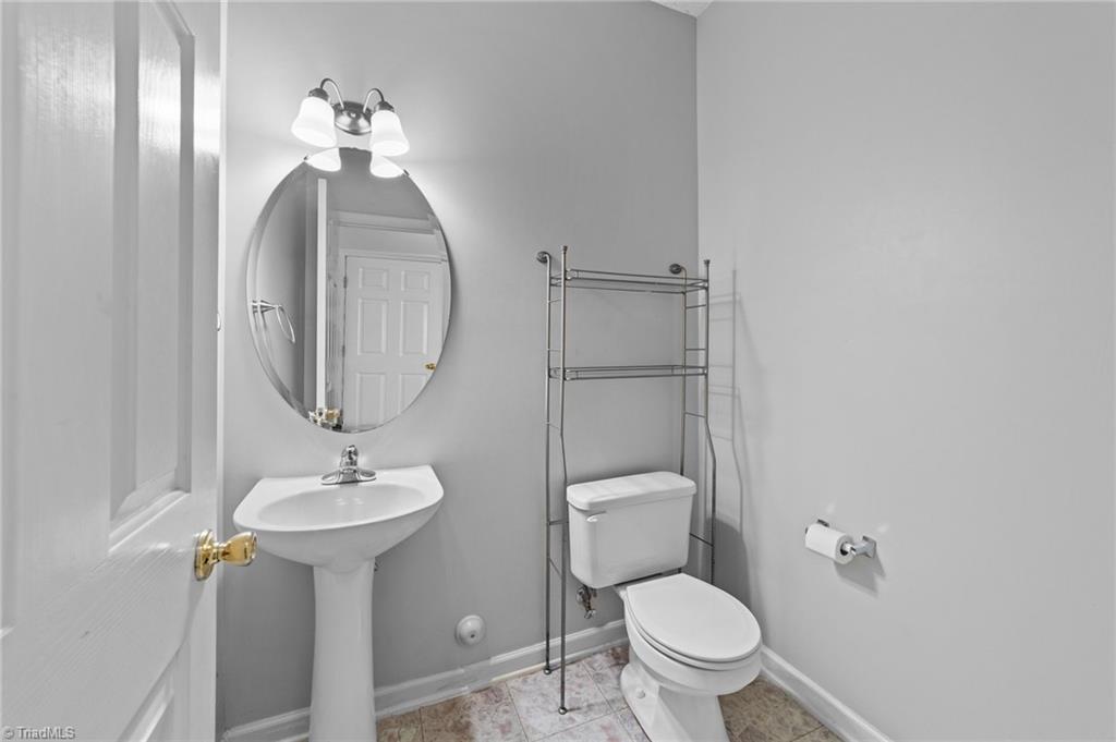 4712 Ridgefall Road Greensboro, NC 27410 - Photo 19 of 44 View of the half bath.