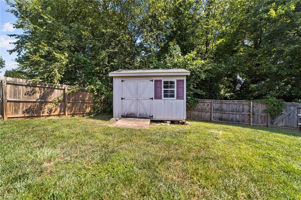 4712 Ridgefall Road Greensboro, NC 27410 - Photo 35 of 44 View of the shed.