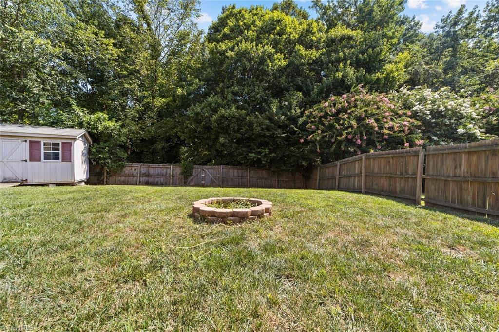 4712 Ridgefall Road Greensboro, NC 27410 - Photo 38 of 44 Another view of the fenced backyard.