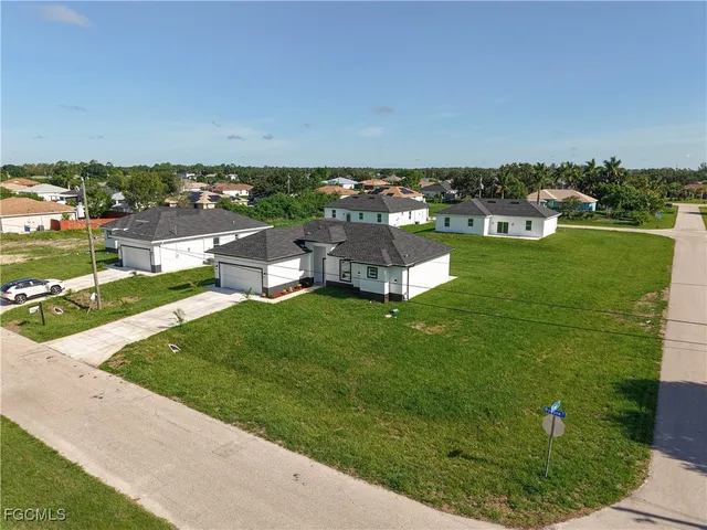 an aerial view of a house with a garden