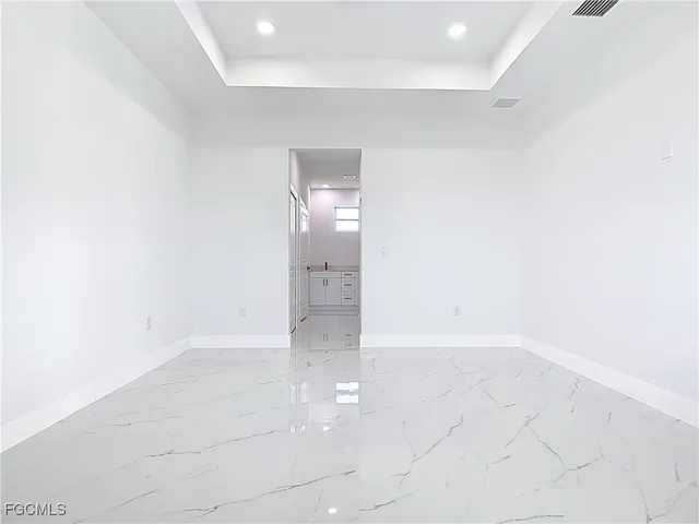 an empty room with an entryway