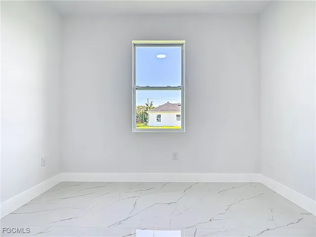 a view of a window in an empty room