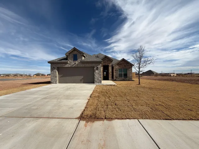 a front view of a house with ocean view