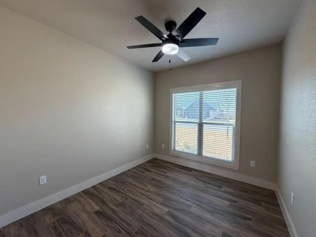 a bathroom with a sink toilet tub and shower