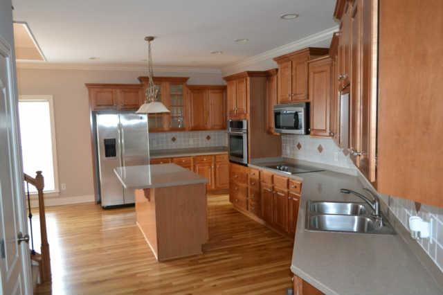 1628 Fair House Road Spring Hill, TN 37174 - Photo 5 of 9 This Large Kitchen has lots of Cabinet Space.