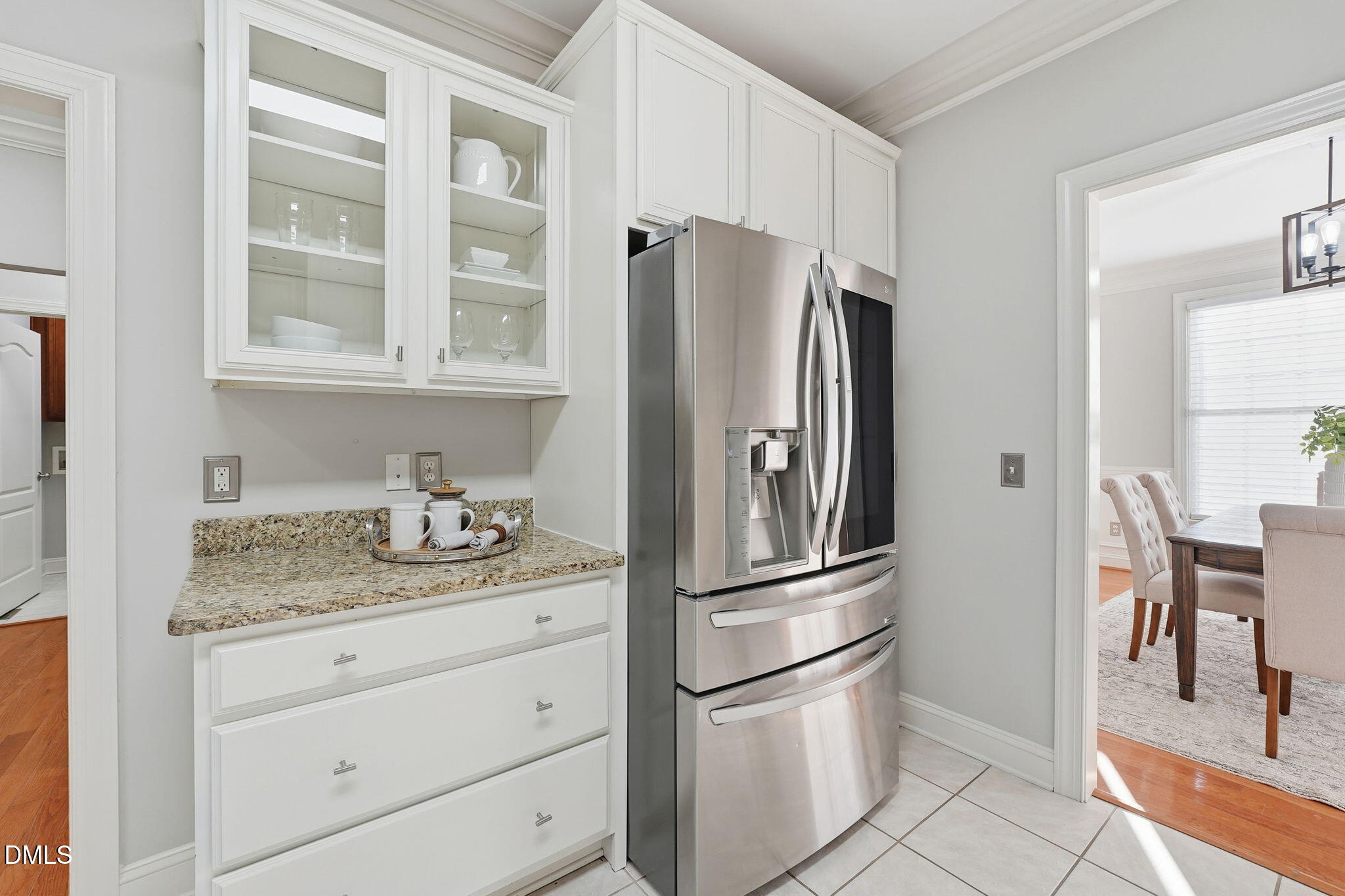 110 Bon Marche Lane Raleigh, NC 27615 - Photo 7 of 25 a kitchen with stainless steel appliances granite countertop a refrigerator and a sink