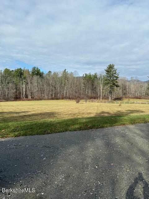 Churchill Street Pittsfield, MA 01201 - Photo 3 of 6 a view of a golf course with a lake