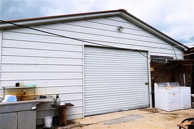 a view of a front of house with garage