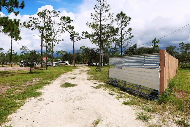 a view of backyard with green space