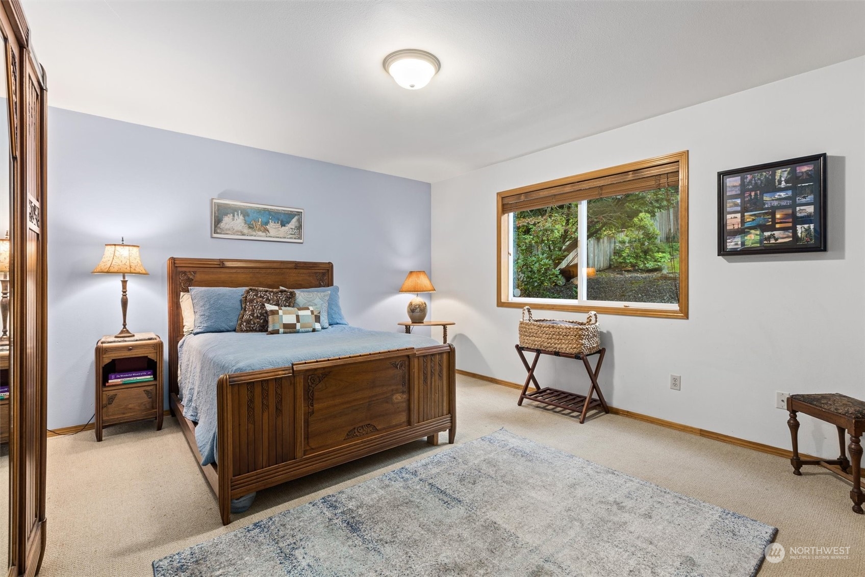 923 Southwest Lake Roesiger Road Snohomish, WA 98290 - Photo 12 of 40 a bedroom with a bed and a window