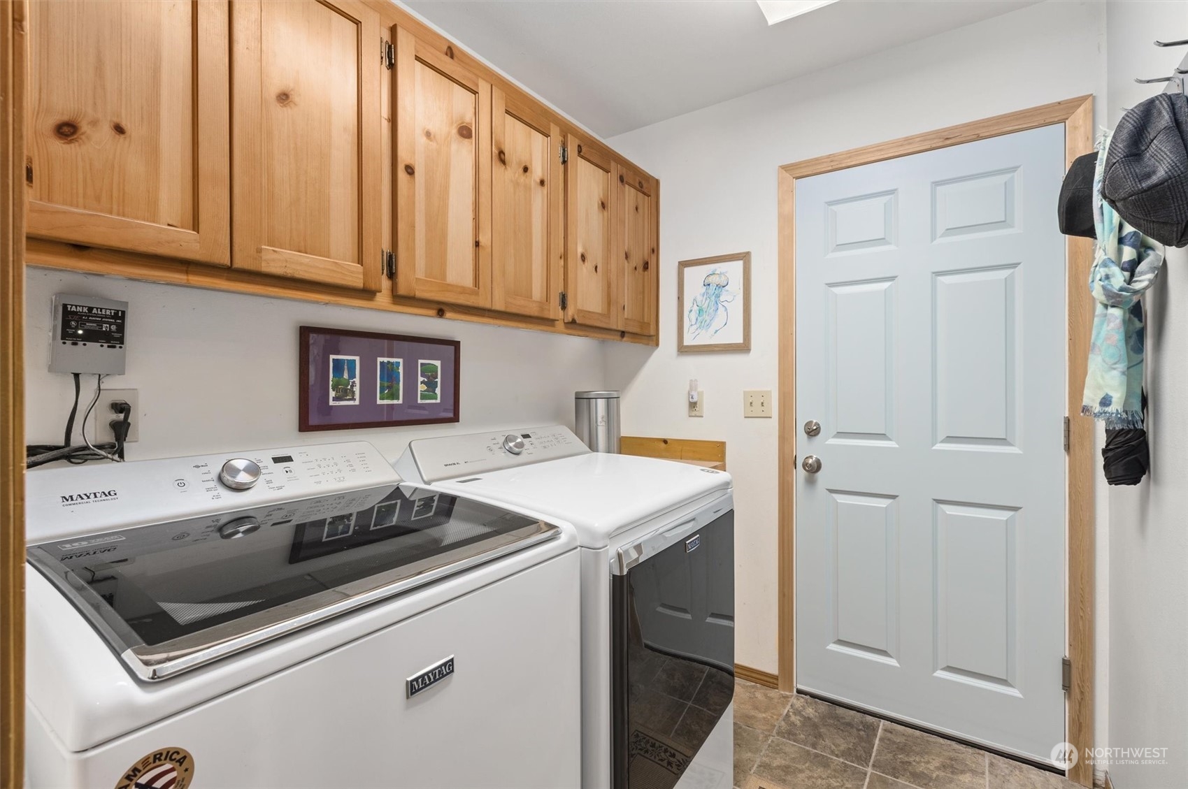 923 Southwest Lake Roesiger Road Snohomish, WA 98290 - Photo 14 of 40 a utility room with stainless steel appliances granite countertop a washer and dryer