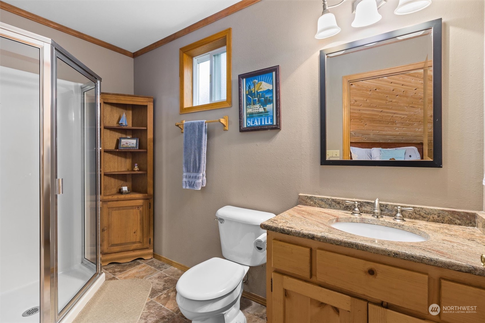 923 Southwest Lake Roesiger Road Snohomish, WA 98290 - Photo 19 of 40 a bathroom with a granite countertop toilet sink and mirror