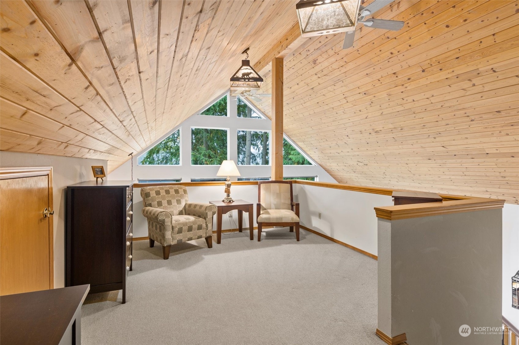 923 Southwest Lake Roesiger Road Snohomish, WA 98290 - Photo 20 of 40 a view of a patio with table and chairs