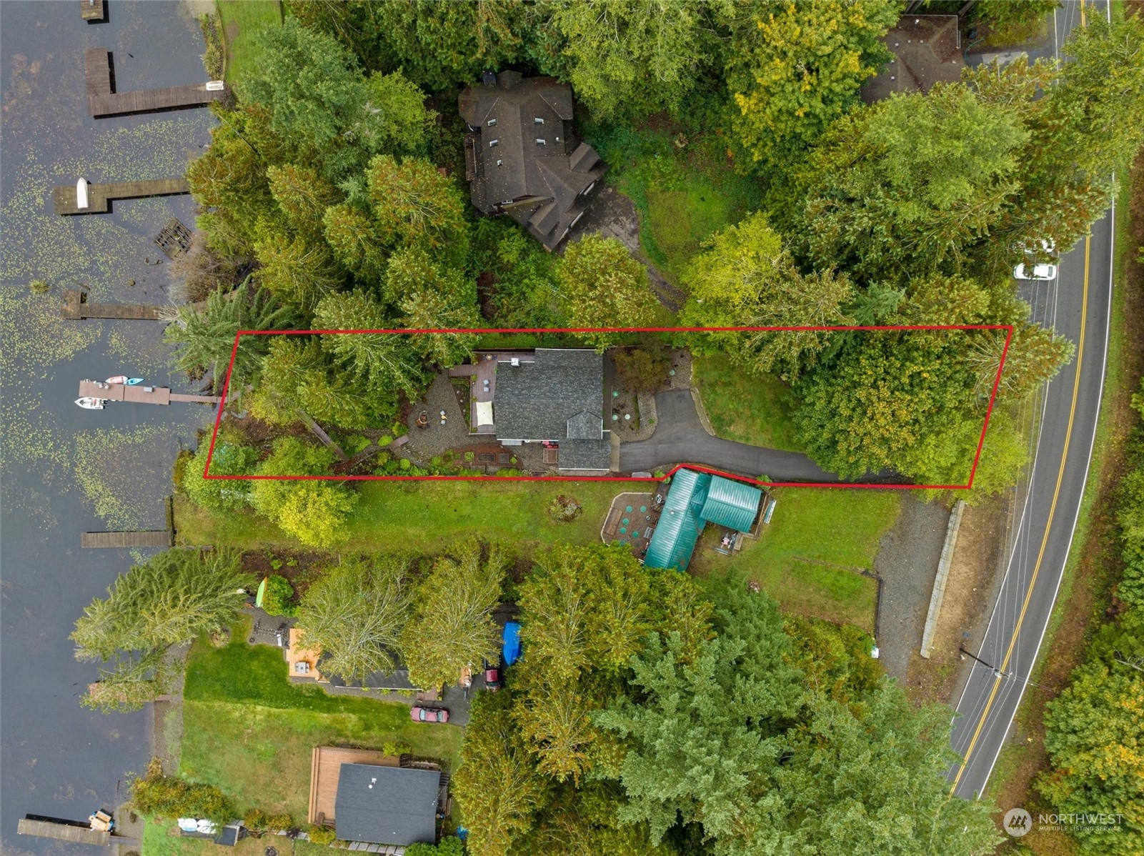923 Southwest Lake Roesiger Road Snohomish, WA 98290 - Photo 32 of 40 an aerial view of a house with a garden