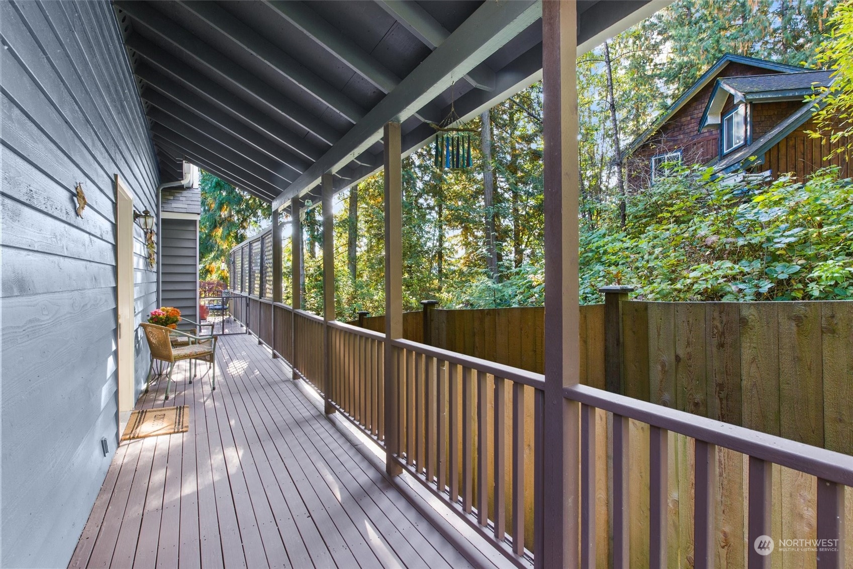 923 Southwest Lake Roesiger Road Snohomish, WA 98290 - Photo 38 of 40 a view of balcony with wooden floor and outdoor seating