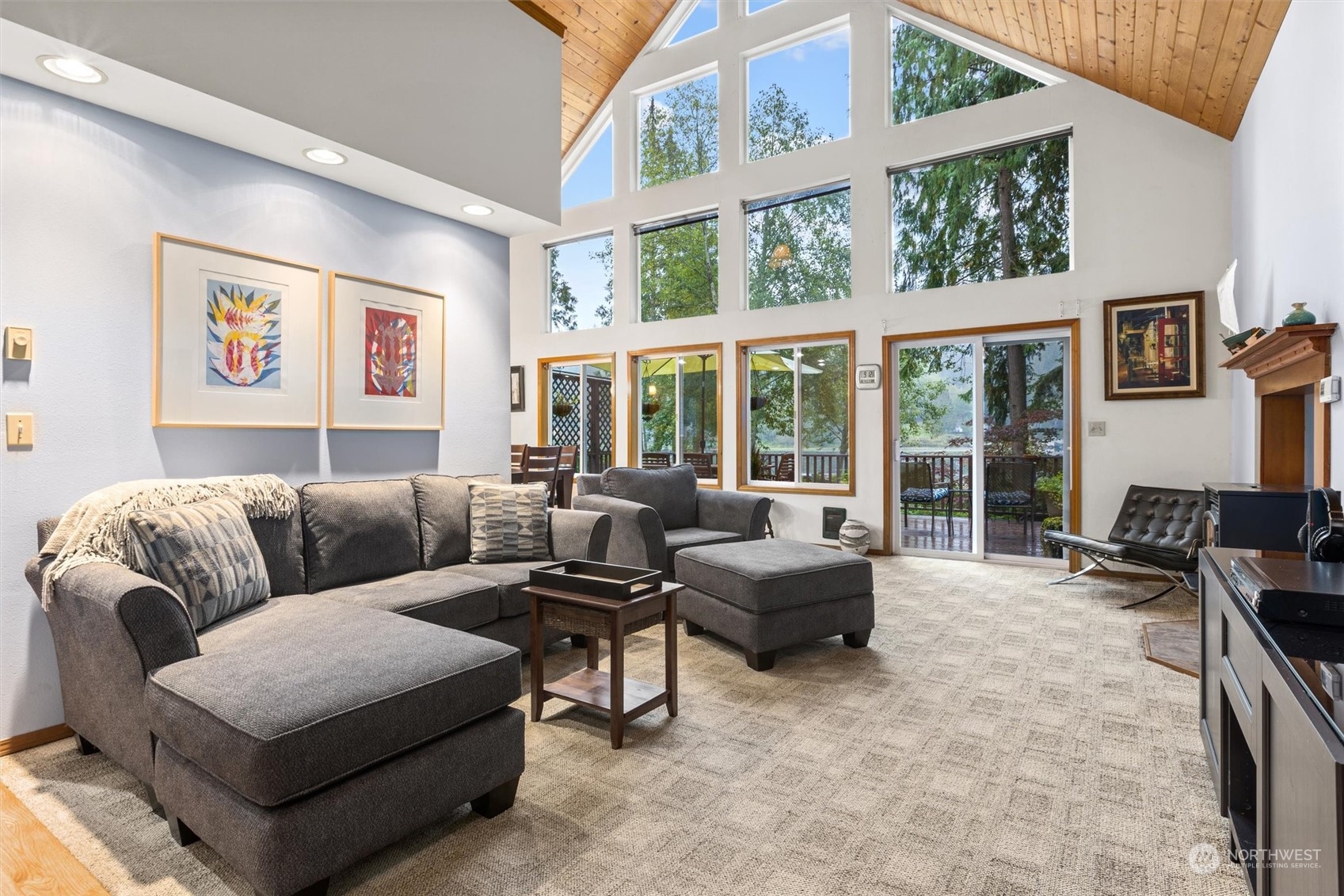923 Southwest Lake Roesiger Road Snohomish, WA 98290 - Photo 5 of 40 a living room with furniture and a large window