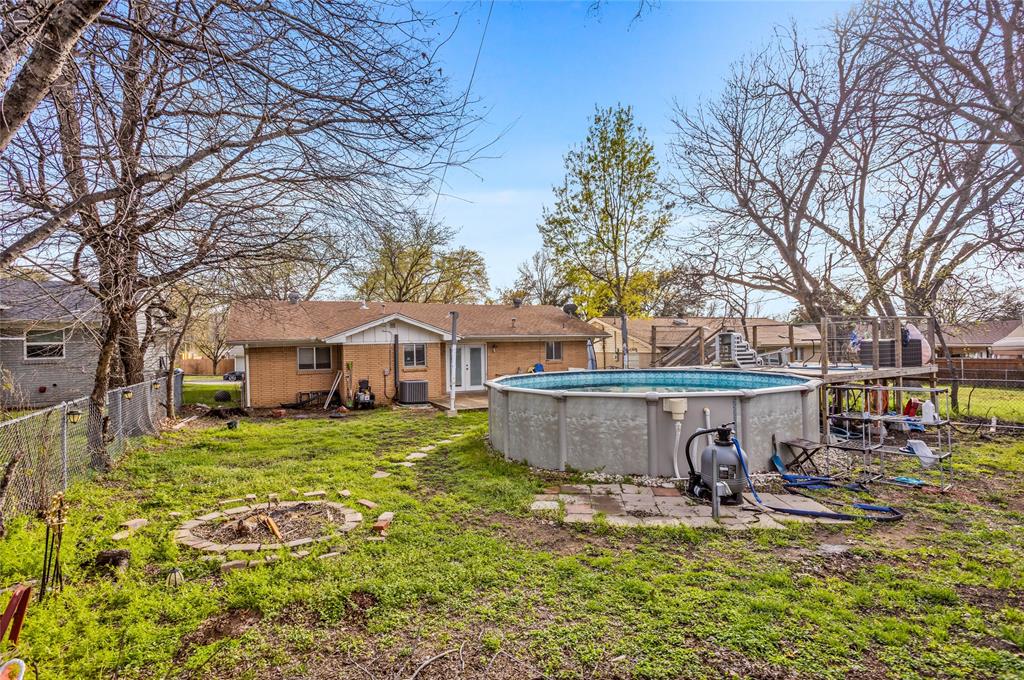 8712 Guadalupe Road Fort Worth, TX 76116 - Photo 21 of 25 a view of a house with garden