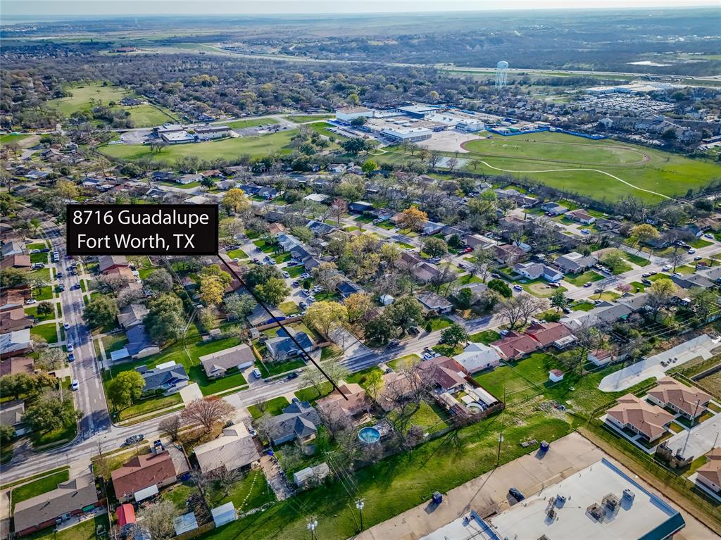 8712 Guadalupe Road Fort Worth, TX 76116 - Photo 24 of 25 an aerial view of residential houses with outdoor space and swimming pool