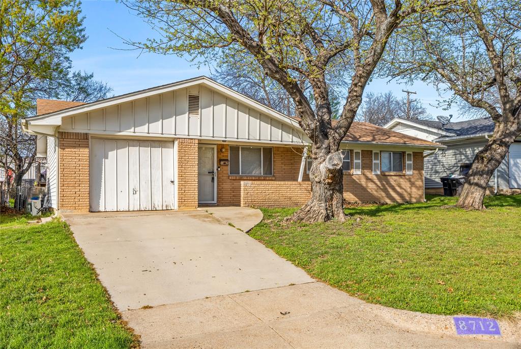 8712 Guadalupe Road Fort Worth, TX 76116 - Photo 3 of 25 a front view of a house with garden
