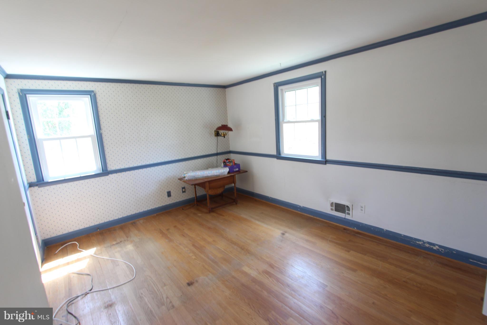 1202 Longford Road Lutherville-Timonium, MD 21093 - Photo 12 of 20 a view of a room with wooden floor and window